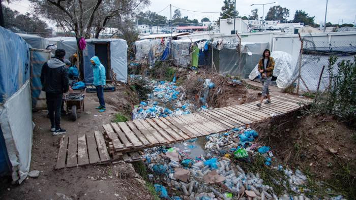More than 9,000 plastic water bottles are distributed every day in the Moria refugee camp, and many end up discarded in the ravine. Reach Beyond's Trash to Treasure program aims to transform the plastic into useful items.