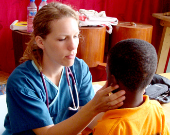 Interns 2012 Staci examining patient2 lr