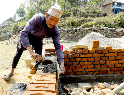 Nepal 2013 19 laying bricks lr