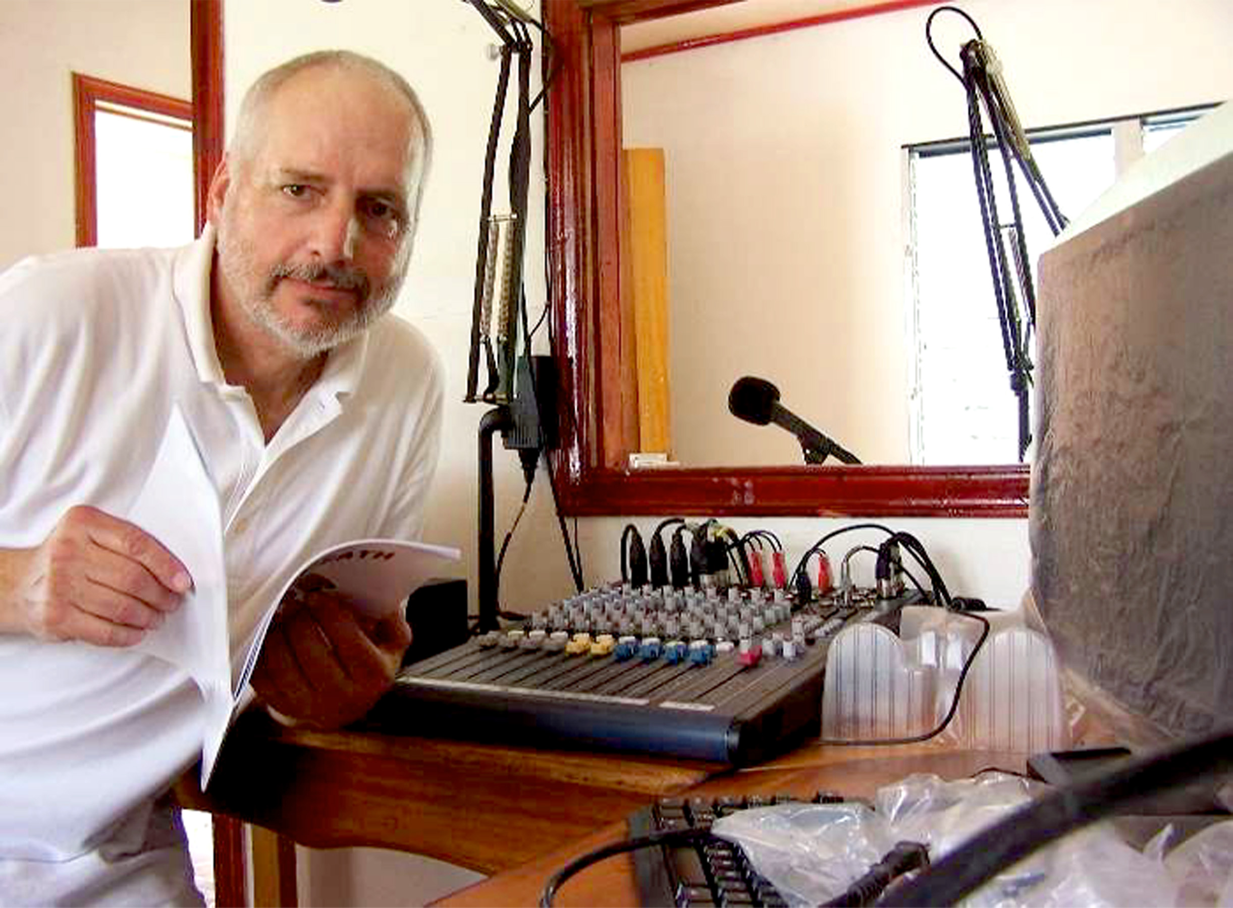 Radio technician Tim Zook installs studio equipment at the new station in Puerto Lempira, Honduras.