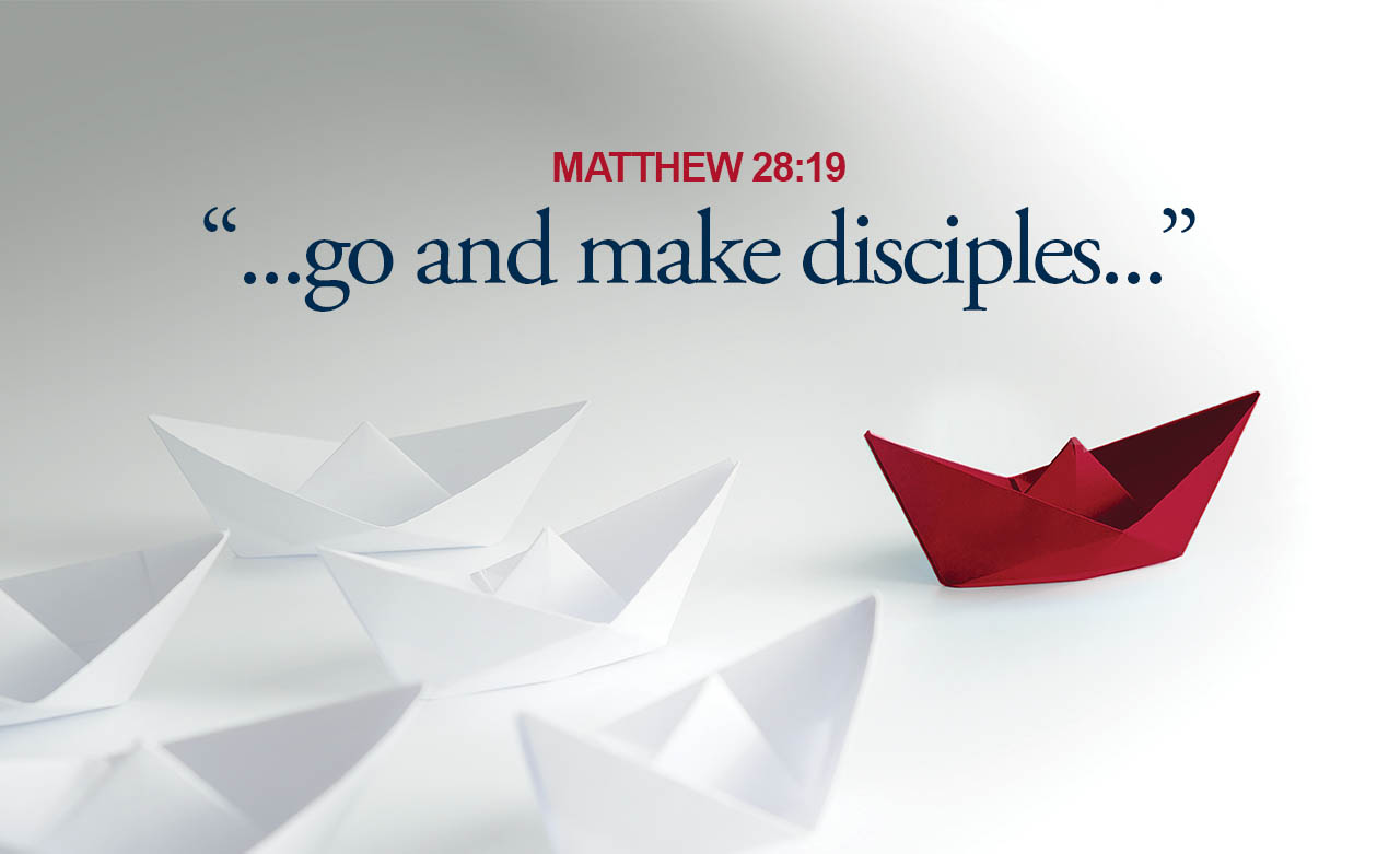Discipleship Illustration - One red origami paper boat leading other white boats