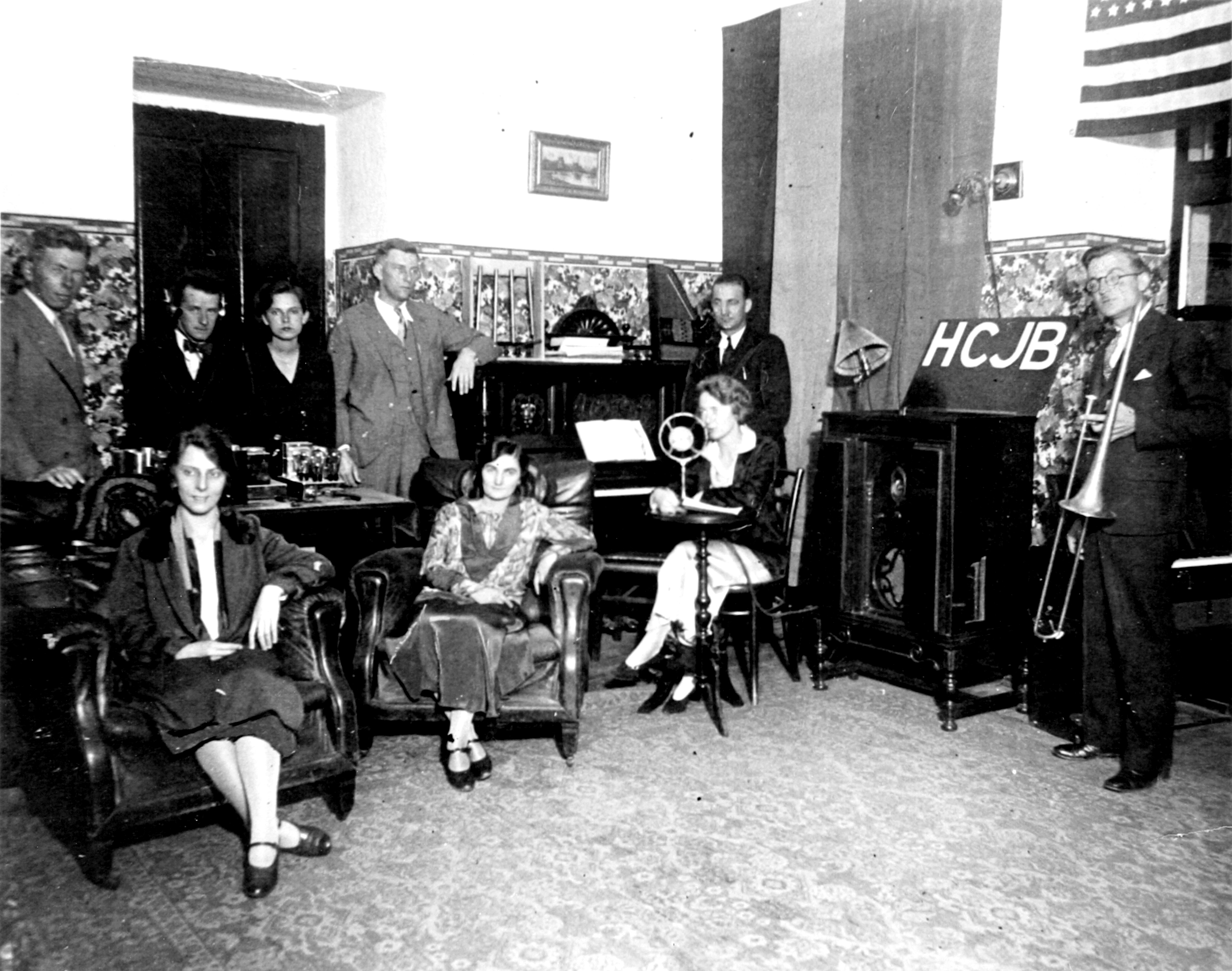 Radio Station HCJB's first Program on Christmas, 1931. (L-R) Pablo Williams, Edna Figg, Eric and Ann Williams, Stuart and Erma Clark, Reuben and Grace Larson, and Clarence Jones. 