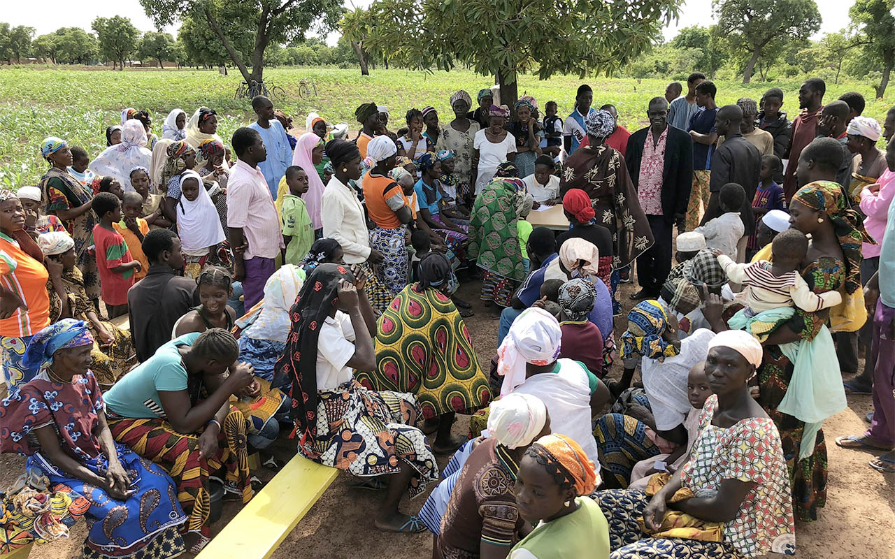 People waiting to be checked in to a Reach Beyond medical outreach in Burkina Faso