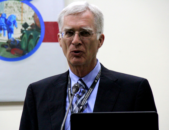 Dr. Dick Douce speaks at a conference.