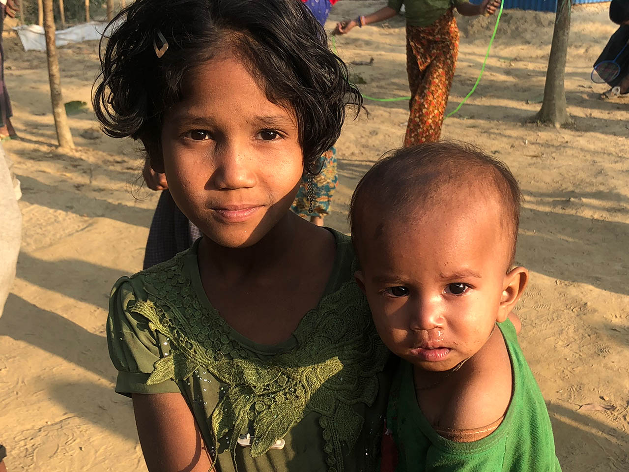 Two Rohingya children in a refugee camp 