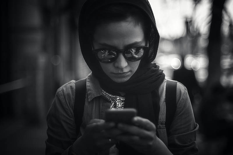 illustration of middle-eastern women texting and emailing