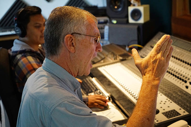 Reach Beyond missionary John Gowan mentors and gives direction during a recording session of Deditos in Guatemala.
