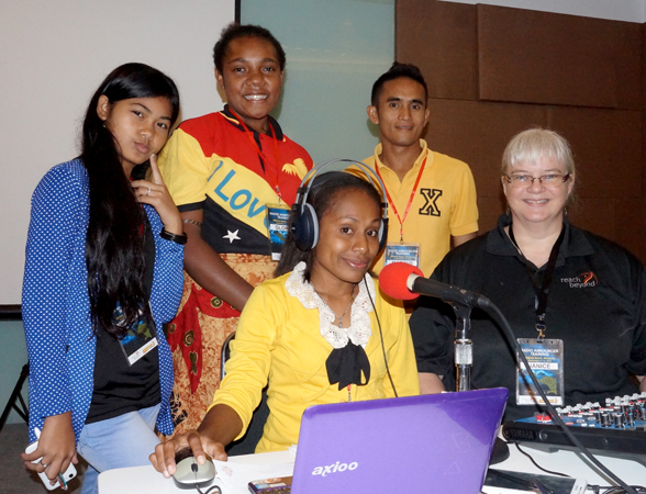 Radio trainer Janice Reid with four of the Indonesian trainees.