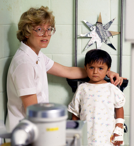 Linda with an Ecuadorian boy who needed X-rays.