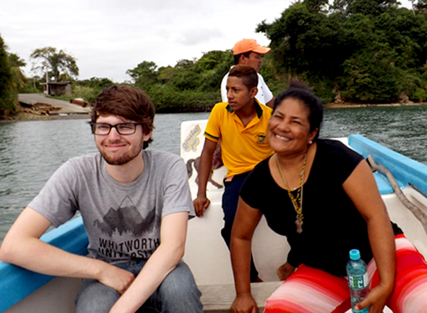 Caleb Smith with co-workers during a boat ride in Ecuador’s Esmeraldas province.
