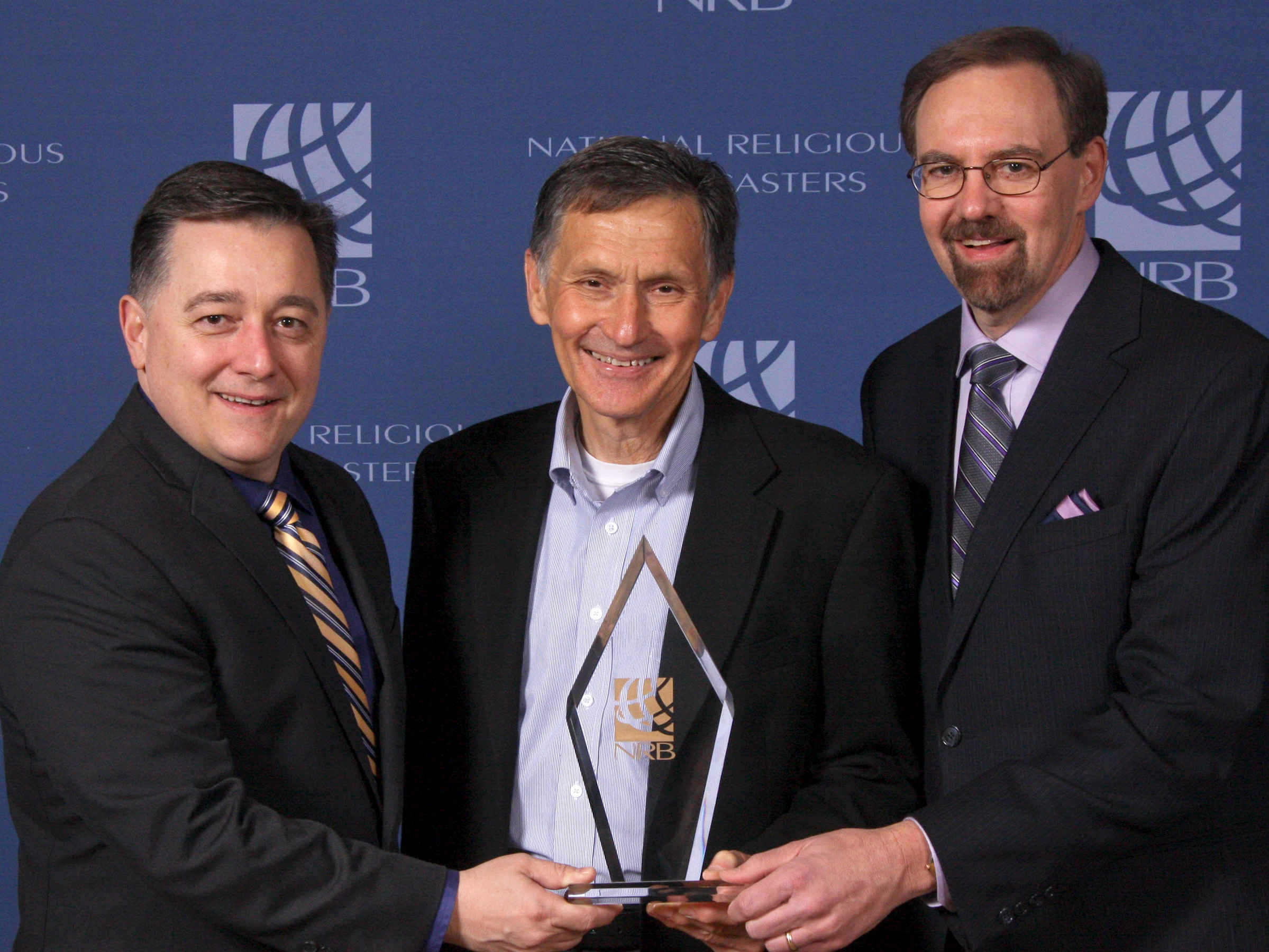 Reach Beyond President Wayne Pederson receives the NRB International Impact Award.