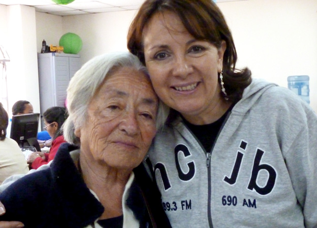 Anabella Cabezas (right) with a faithful listener to Radio Station HCJB.