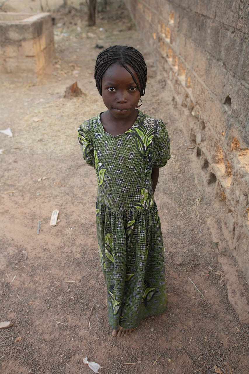 Little girl in green