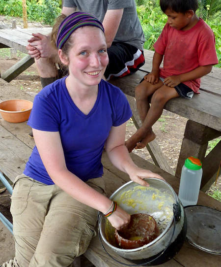 Rachel Kunker helps make chicha, a typical drink made from manioc in Ecuador's Amazon region.