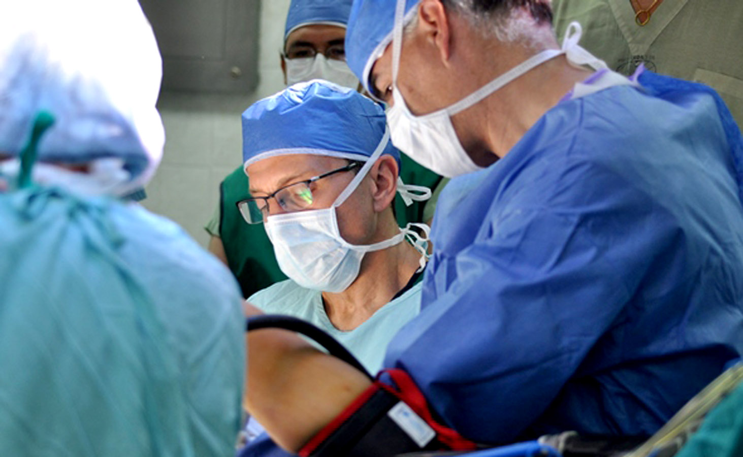 Drs. Novacheck (center), de la Maza (right) and Wolff (above) in the operating room at Hospital Vozandes-Quito.