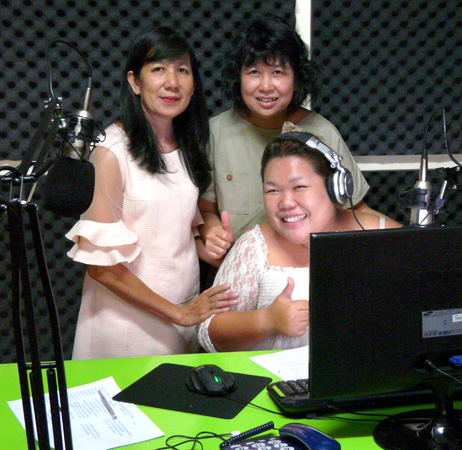 Three ladies in the studio of the restored radio station in rural Thailand.