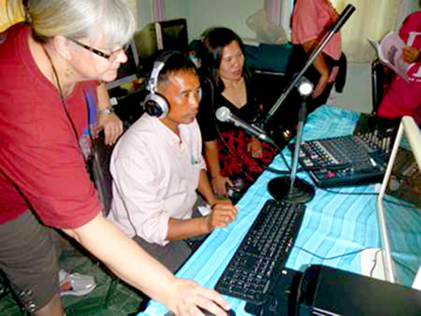Radio trainer Janice Reid gives tips to broadcasters in Thailand.